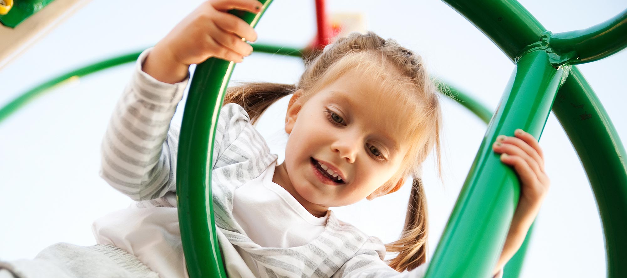 Girl on Playground - Pediatric Dentist in Madison, MS